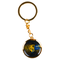 Round keyring with "1FCS" in gold